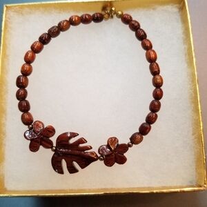 Elegant Brown Beaded Necklace with Floral Accents
